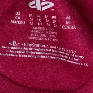 A PlayStation hoodie (crop top hoodie).